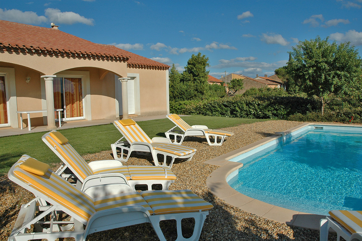 Sun loungers by the pool